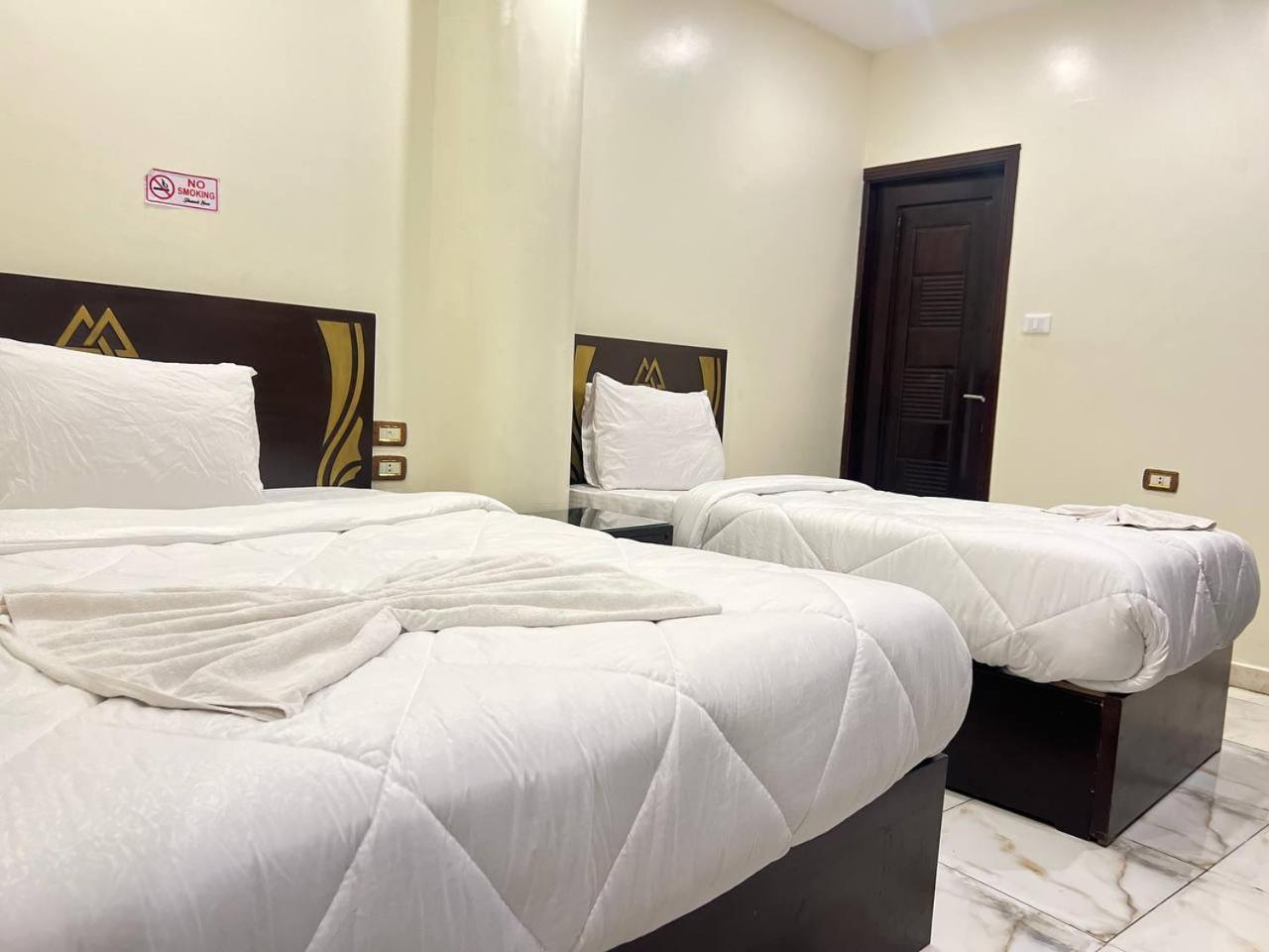 City Pyramids Inn Kafret el-Gabal Buitenkant foto