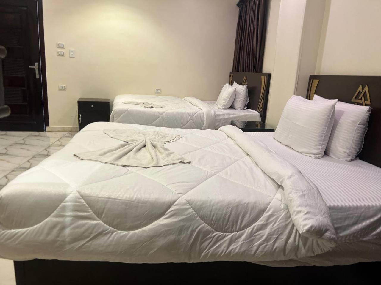 City Pyramids Inn Kafret el-Gabal Buitenkant foto